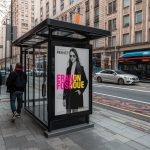 Lucid_Origin_A_modern_glass_bus_shelter_on_a_downtown_street_f_3